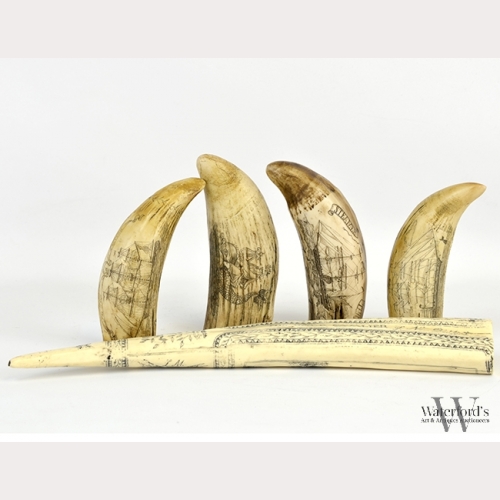 A Group of Scrimshawed Resin Faux Whale's Teeth