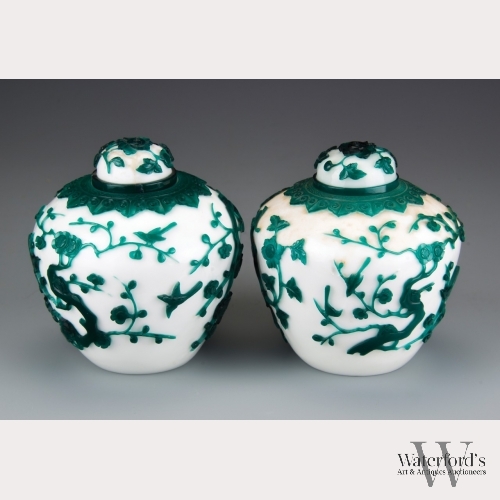 A Pair of White Peking Glass Jars with Green Overlay