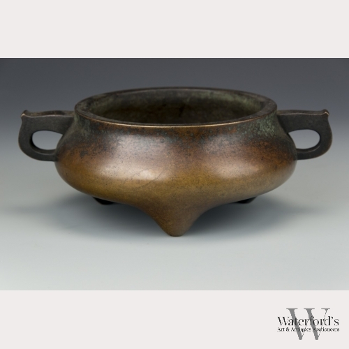 A Chinese Bronze Tripod Censer