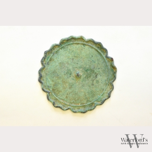 A Chinese Bronze Octafoil Mirror, Tang Dynasty