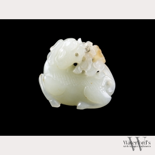 A Chinese White Jade Carving of a Qilin