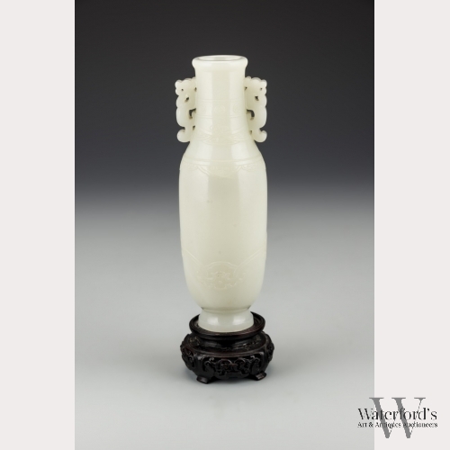 A Chinese White Jade Baluster Vase with Stand, Qianlong Period