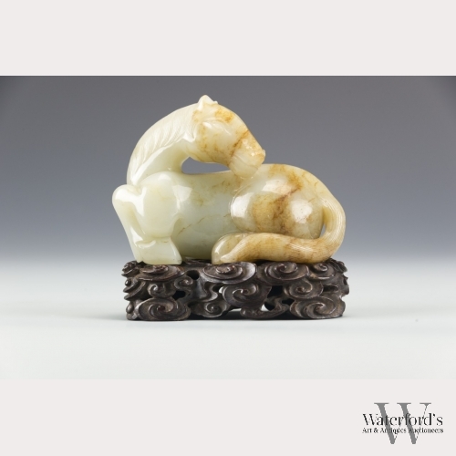 A Chinese Celadon Jade Carving of a Horse