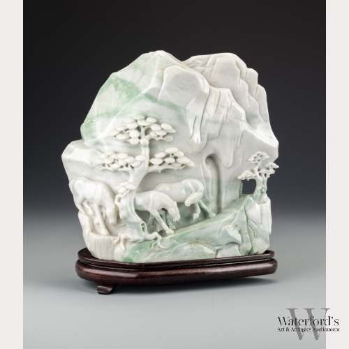 A Chinese White and Green Jade Boulder Carving