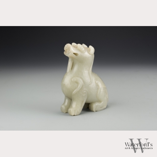 A Chinese Light Celadon Jade Beast