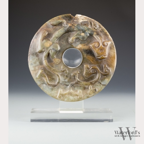 A Chinese Mottled Jade Bi Disk with Chilong