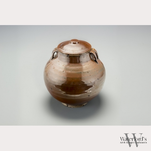 A Chinese Cizhou Persimmon Glazed Covered Jar
