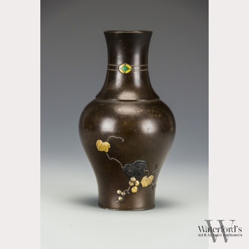 A Japanese Bronze Vase with Grapevines