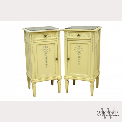 A Pair of Marble Top Continental Nightstands