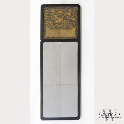 A Woman's Gold and Silver Rank Badge on Mirror