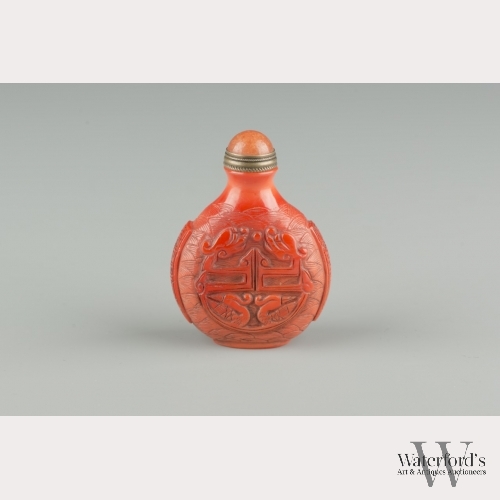 A Carved Chinese Red Peking Glass Snuff Bottle