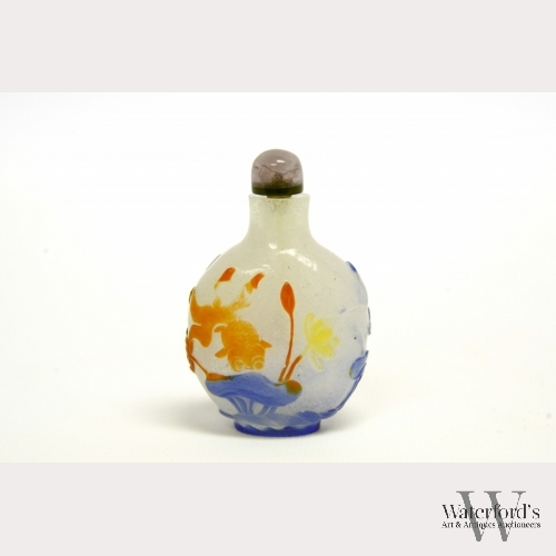 A Chinese Peking Glass Overlay Snuff Bottle