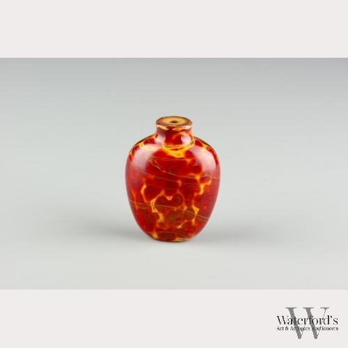 A Red and Brown Glass Chinese Snuff Bottle