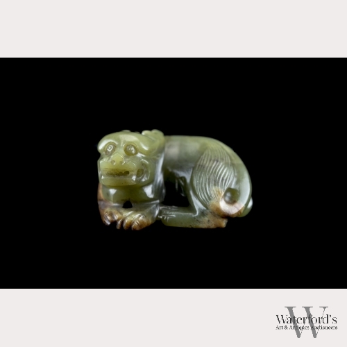 A Chinese Spinach Jade Recumbent Qilin