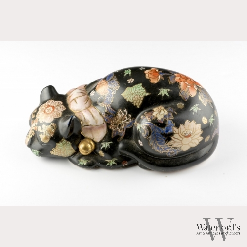 A Chinese Ceramic Cat with Painted Floral Pattern