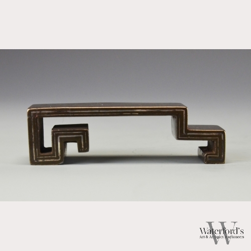 A Chinese Bronze and Silver Wrist Rest