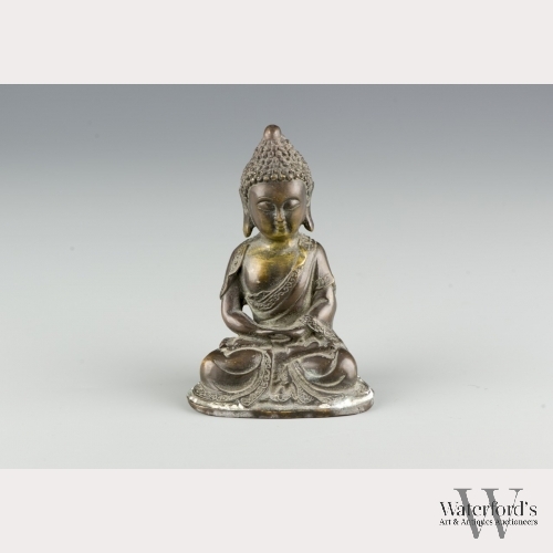 A Tibetan Bronze Seated Buddha