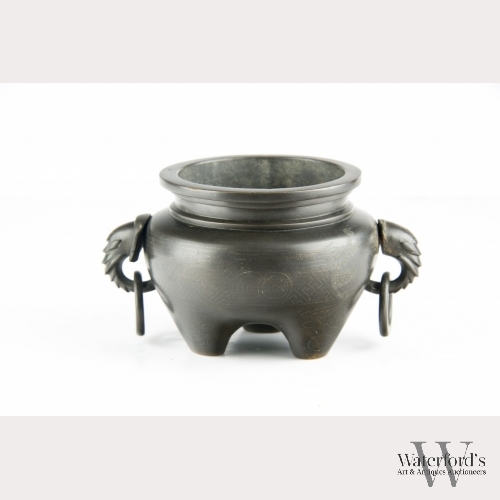 A Chinese Bronze Tripod Censer, Qing Dynasty