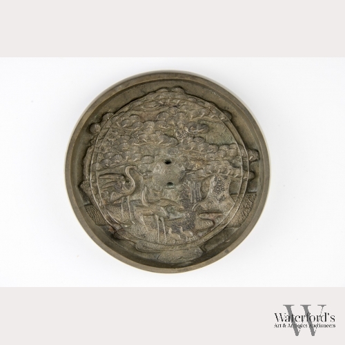A Japanese Silvered Bronze Mirror