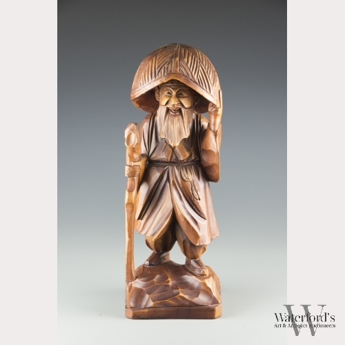 A Korean Wood Sculpture of Kim Satgat