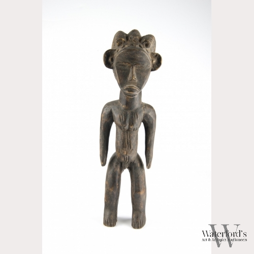 An African Wood Carving of a Male Figure, Dan