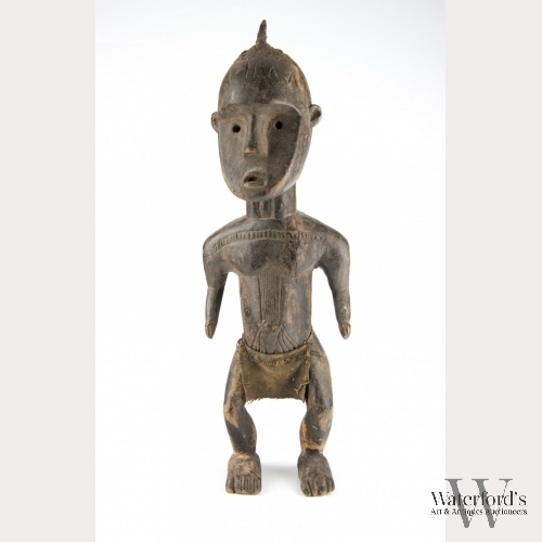 An African Carved Wood Figure, Male
