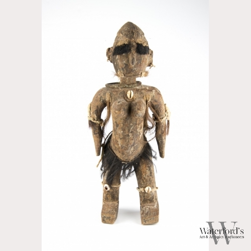 An African Carved Wood Fetish Doll, Female