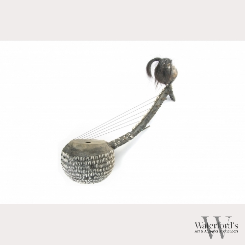 An African Gourd Harp with Shells and Maracas