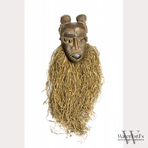 An African Carved Wood Bamileke Mask, Cameroon