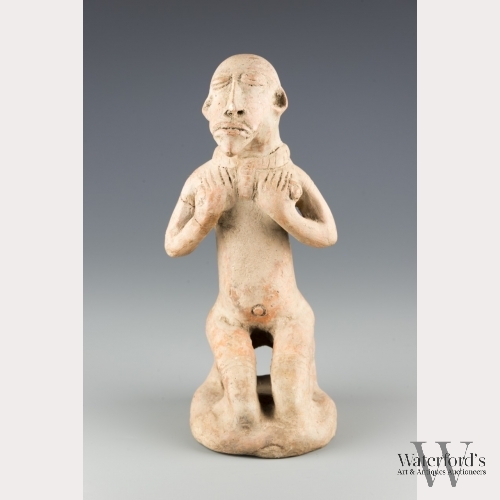 A Ceramic Sculpture of a Figure